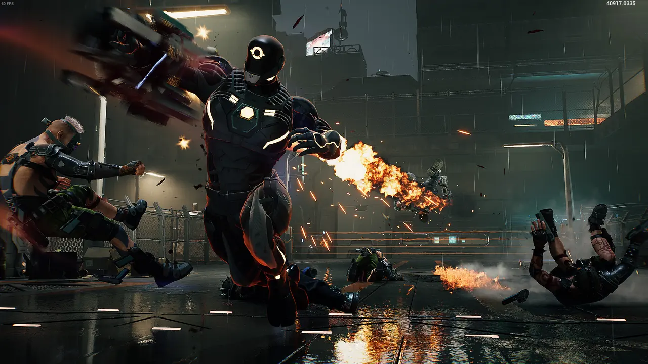 A fighter in a lit suit pushing back enemies with flames while others are knocked to the ground